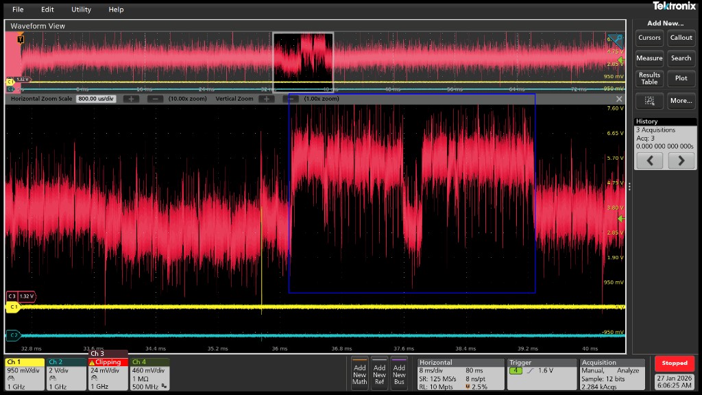 Power consumption trace showing an unexpected flash write triggered by a laser pulse.